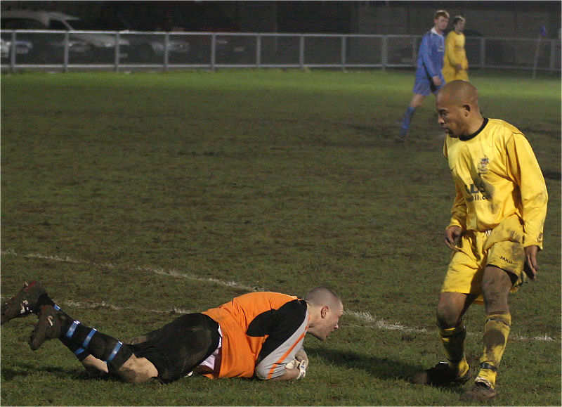 Ronan Callaghan grabs the ball away from Stafford Browne
