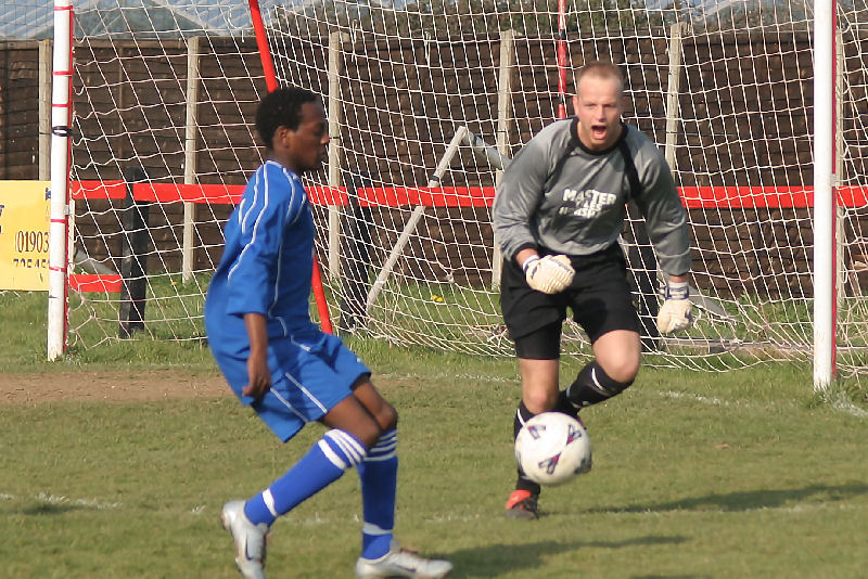 Christian Chimutengwende leaves the ball to keeper James McGrath
