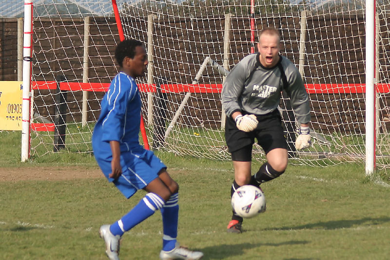 Christian Chimutengwende leaves the ball to keeper James McGrath
