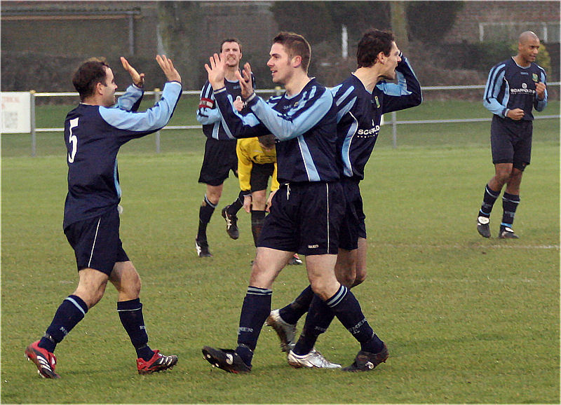 Gavin Jones is congratulated by Mickey O'Callaghan on opening the scoring for Ringmer in the first minute ...
