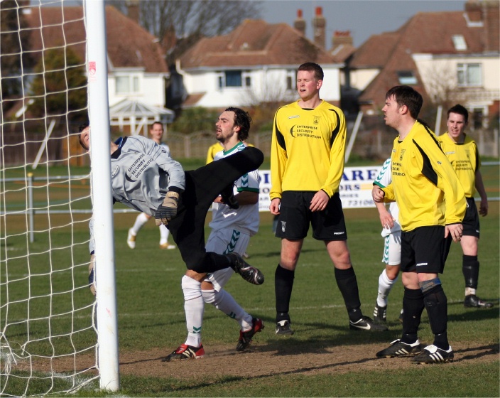 Jon Hendrick tips a shot over
