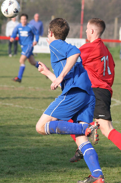 Scott Avory and Danny Curd (11) chase the ball
