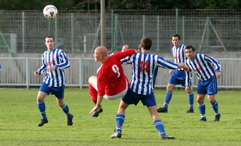 Scott Tipper tries with an overhead kick
