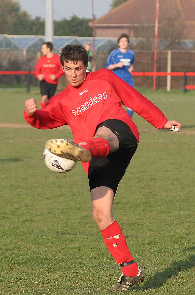 Tom Manton drives the ball into the area
