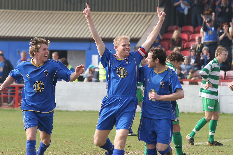 Steve Butler celebrates with Richard Butler (left) and Rob Ursell
