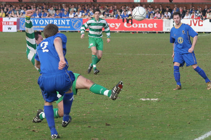 Anthony Howard (2) manages to clear the ball up to Rob Ursell
