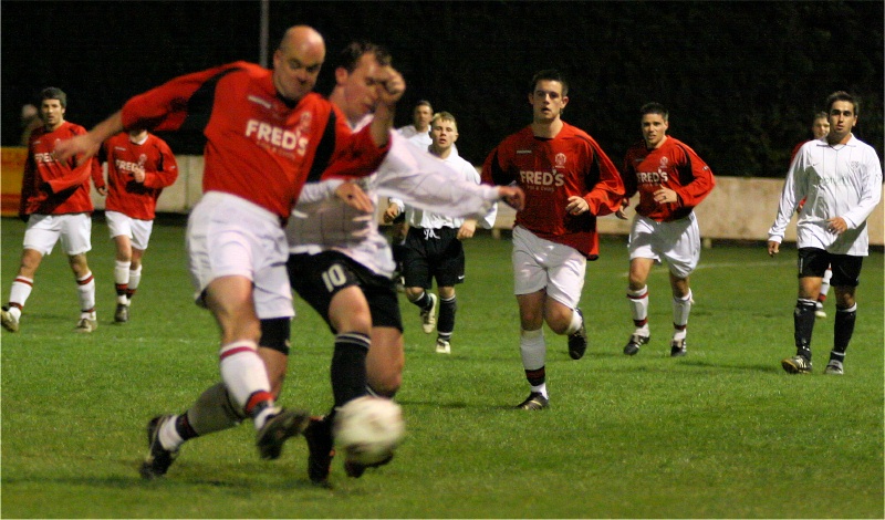 Tony Miles clears from Dan White
