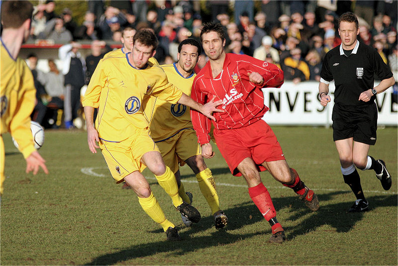 Antony Howard stops Sam Francis getting the ball
