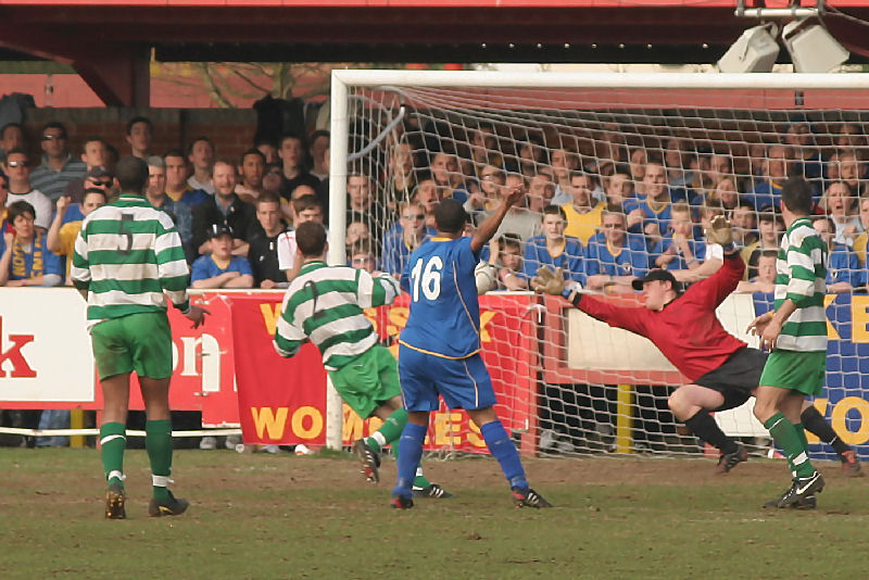 Leon McDowall slots home the Dons 3rd goal
