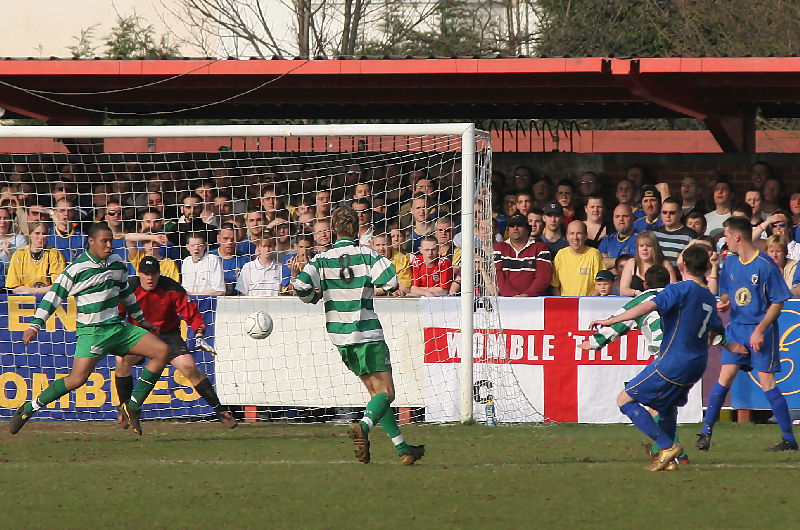 This attempt by Rob Ursell (7) is cleared by Will Jenkins
