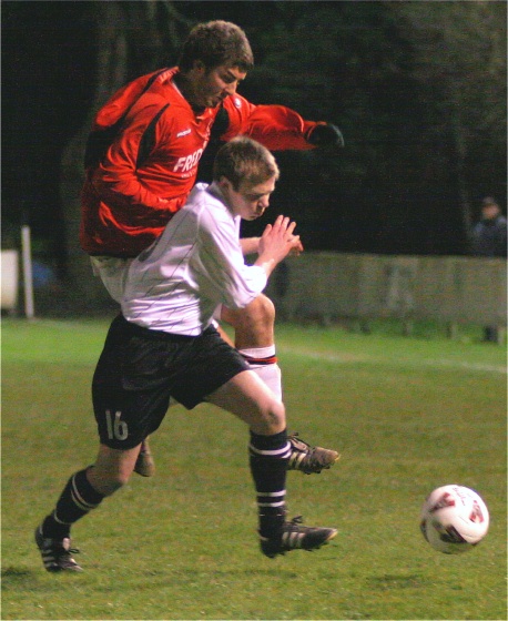 Simon White clashes with Tom Manton
