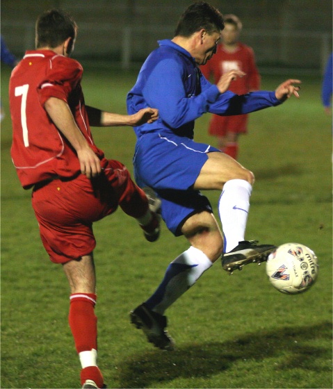 Terry Withers is tackled by Sean Breach
