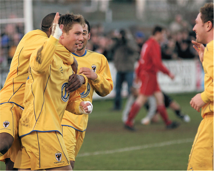 Richard Butler celebrates getting the Dons 2nd goal
