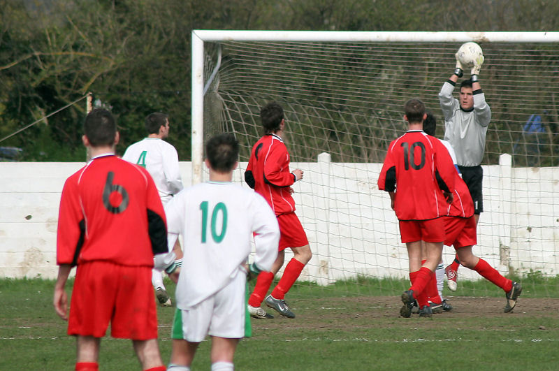 Barry Squires takes a catch under the bar
