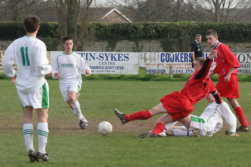 Hassocks captain Chris  Hewitt is tackled by Scott Tipper
