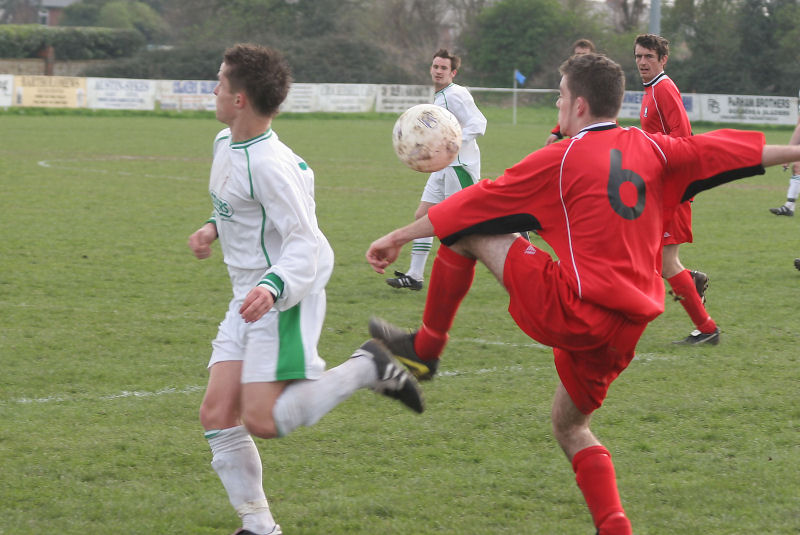 Ashley Marsh (6) stops the ball reaching Scott Murfin
