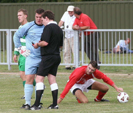 Dave Walker is brought down by the Dorking keeper and Kane Evans makes it four, from the spot
