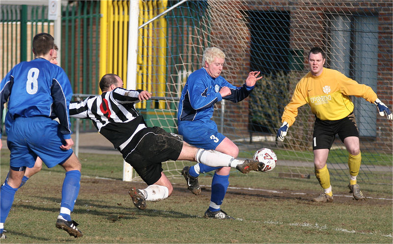 Rustington are relieved to see this Mark Price effort come back off the post
