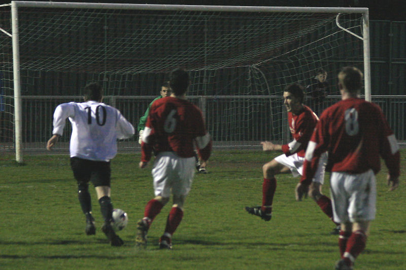 Aaron McMillan (10)  takes the ball and gets in a dangerous cross ...

