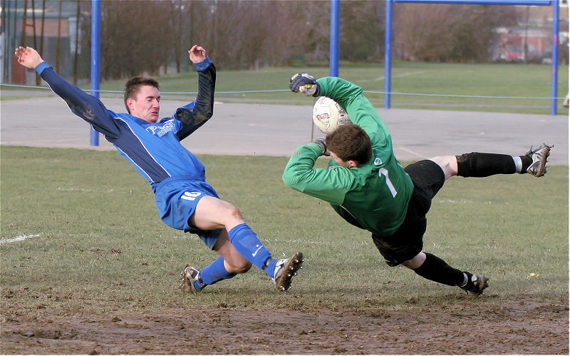 Simon Parsons makes a great save from Mike Hatch
