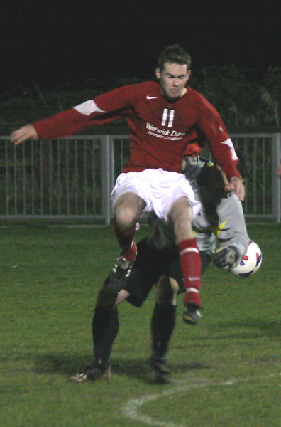 Andy Boxall (11) tangles with Sam Figg
