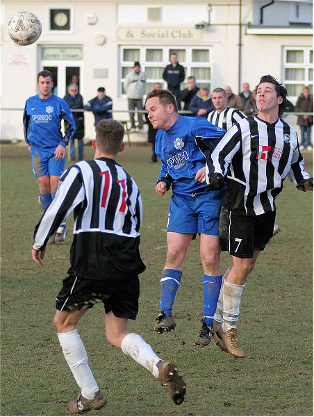 Dave Grover (5) and Jamie Wright (7) compete
