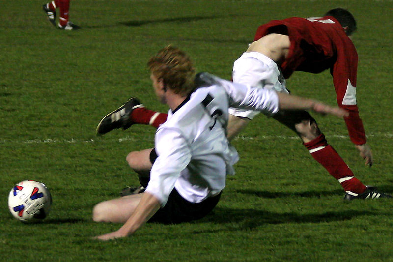 Dan Jordan gets in a good tackle on Andy Boxall
