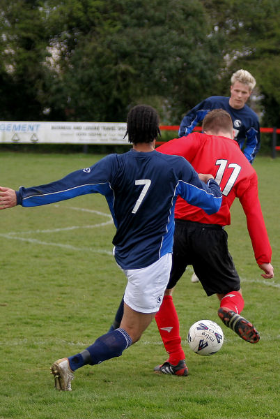 Richard Piper (7) tackles Danny Curd
