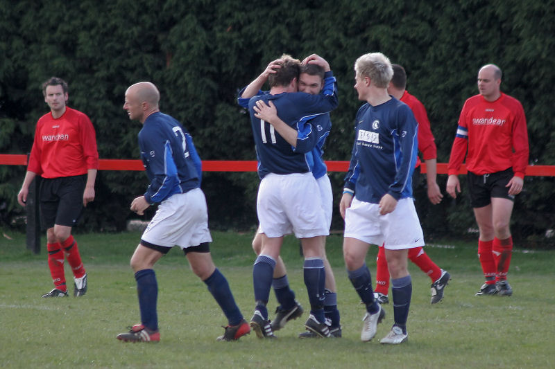 Scorer Danny Baker is congratulated by Tom Nowell (11)
