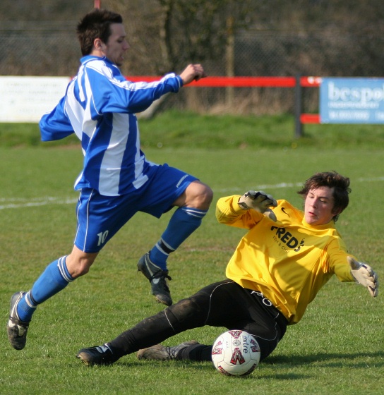 Steve Phillips spreads himself in front of Pat Dunning but the whistle has gone for offside anyway
