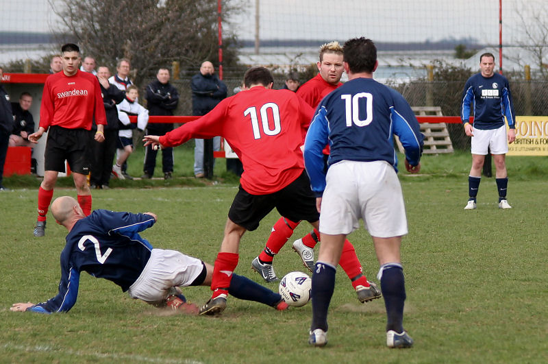 Alan Dove (2) tackles Tom Manton (10)
