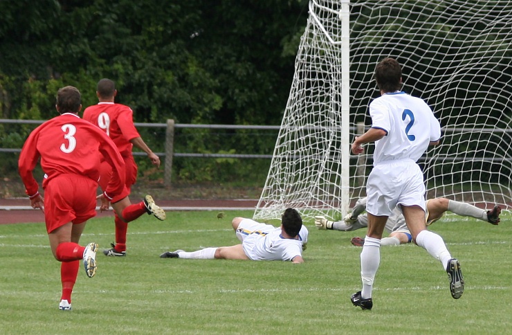 Eben Allen (9) opens the scoring for Walton & Hersham on 9 minutes
