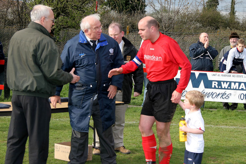 Tony Miles and son Andrew meet Paul Beard, SCFL Secretary, Peter Bentley, Chairman of the SCFL  
