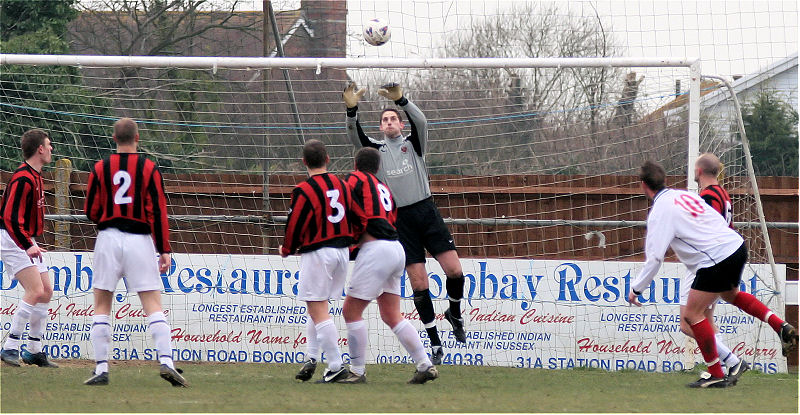 Scott Kenward saves from Brett Forden
