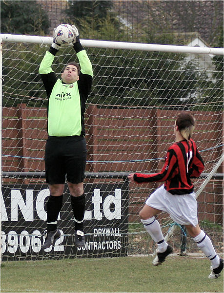 James Leahy catches with Pat Dunning running in
