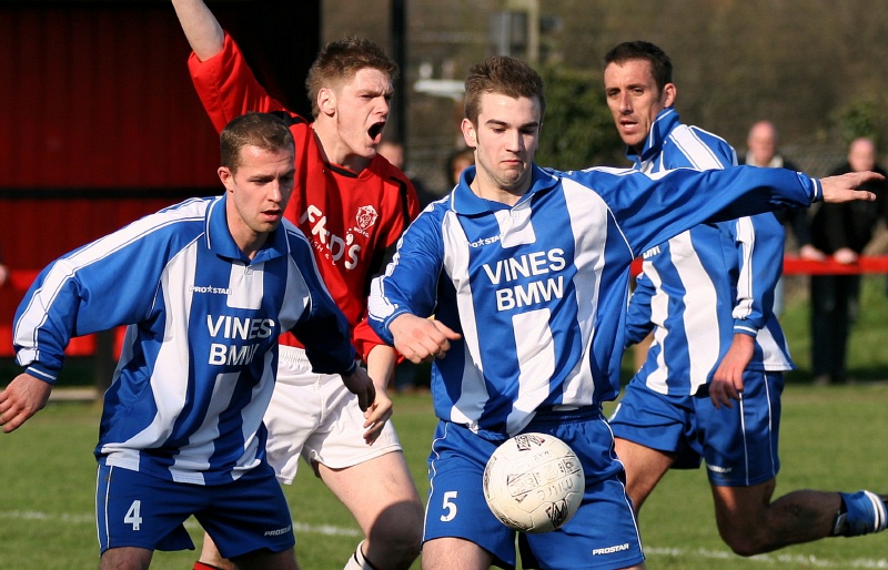 Alex Bacon watches as Mark Zydonik clears 
