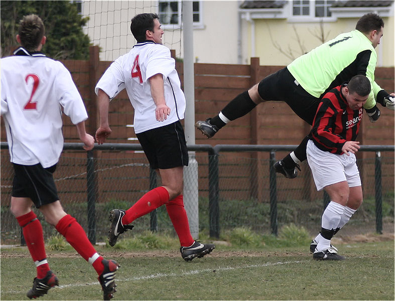 James Leahy clears away from Zak Newman
