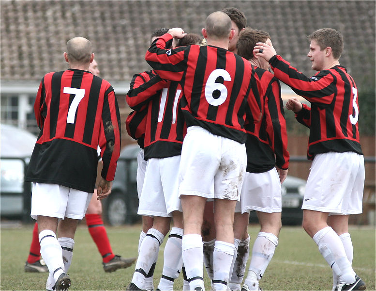 Pat Dunning (11) celebrates scoring for Oakwood 
