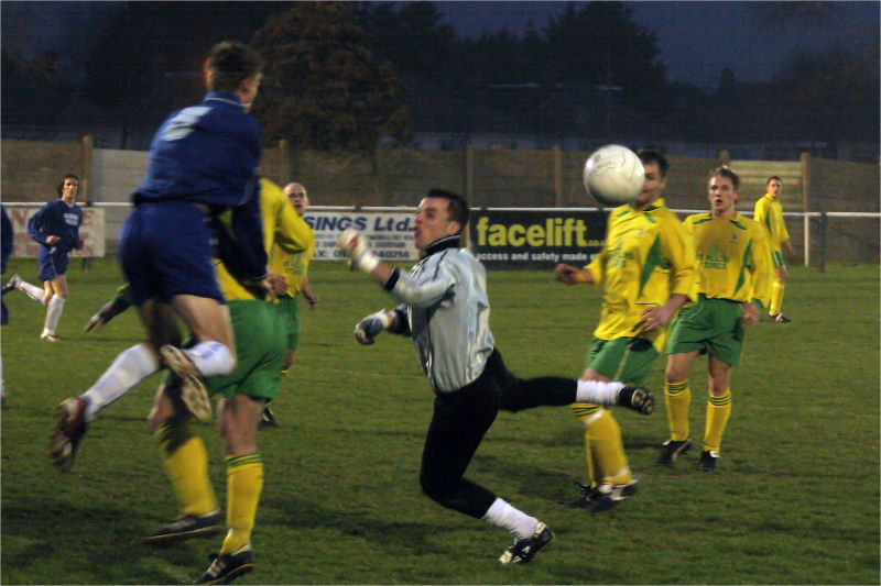 A Westfield player cuts the ball out challenged by Matt Hurley with keeper Peter Newstead on hand
