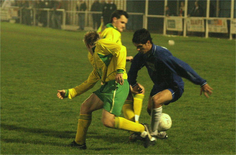 Paul Henty (2) tussles with Shaheen Sadough (11) again
