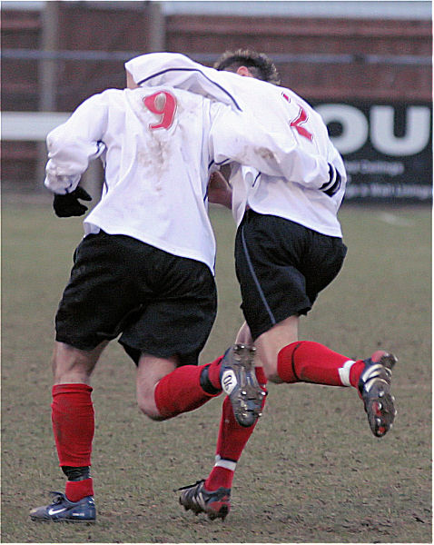 Rob Wimble gets an 89th minute equaliser for Pagham and is congratulated by Mark Livermore
