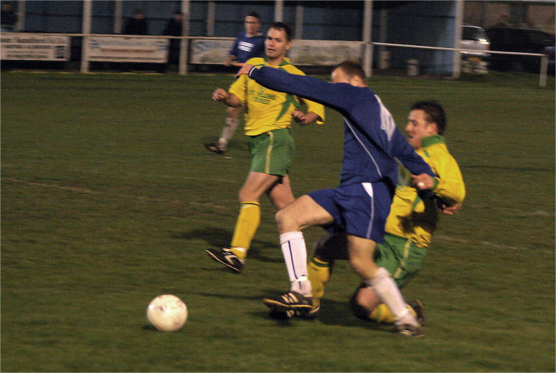 Darren Annis is tackled in the area...
