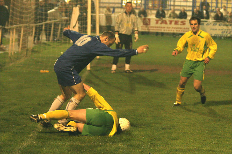 Darren Annis is tackled in the area...
