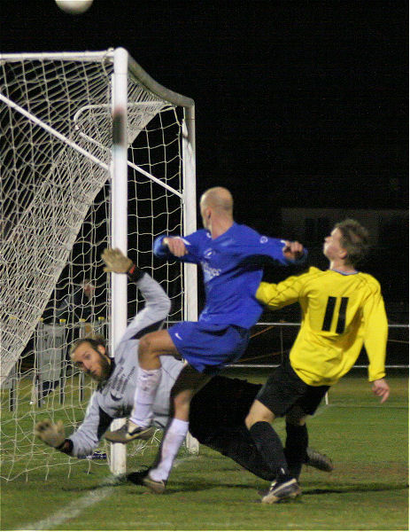 ... but Paul McMichael puts the rebound just wide under pressure from Ben Torode
