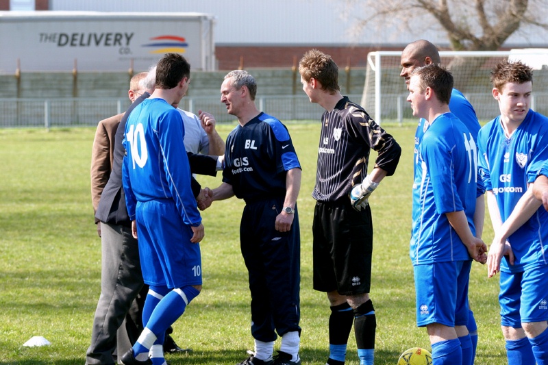 The Pease Pottage Village team are presented to Peter Bentley and Steve Nealgrove of the SCFL and Matthew Major of Shoreham FC
