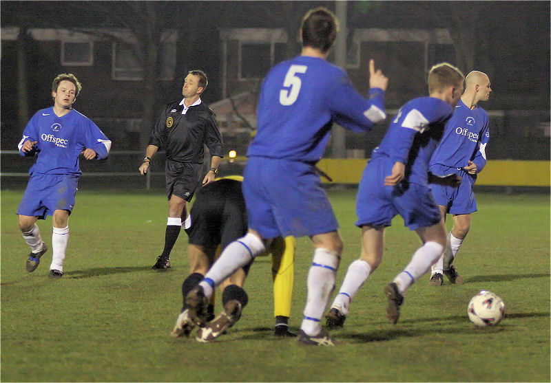 James Davis brings the ball away as Tom Pickford lets the ref know he didn't foul Derek Chester
