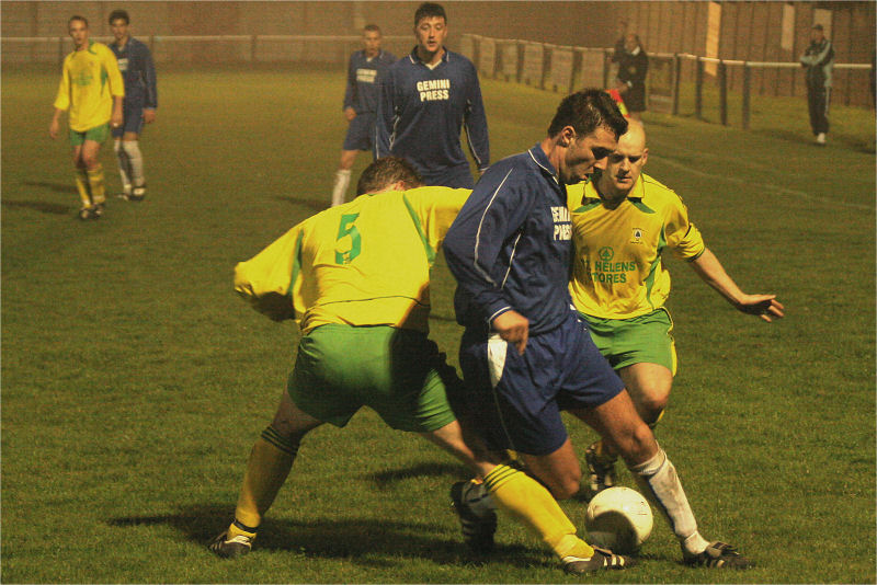 Richard Carter is tackled by Mark Drinkwater
