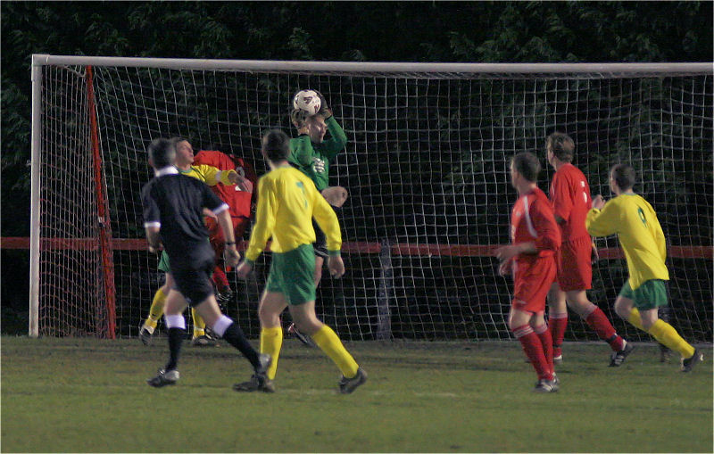 Matt Heasman in the Crawley Down goal collects
