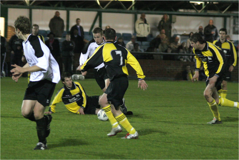 Matt Hoyte attracts defenders while Nick Branch makes his run
