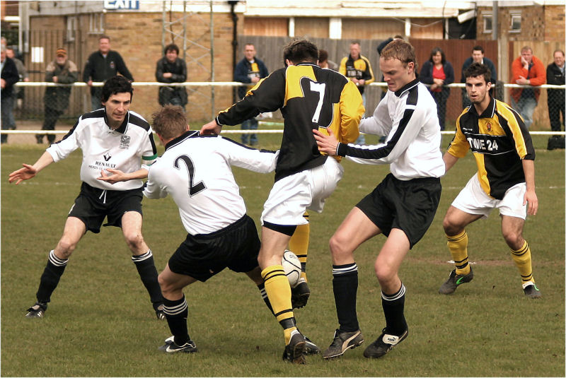 Steve Harper (7) gets past Paul Gower, Matt Ottley (2) and Danny Thomas ...
